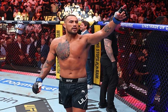 Карлос Ульберг завоевал титул в полутяжелом весе UFC, несмотря на травму колена